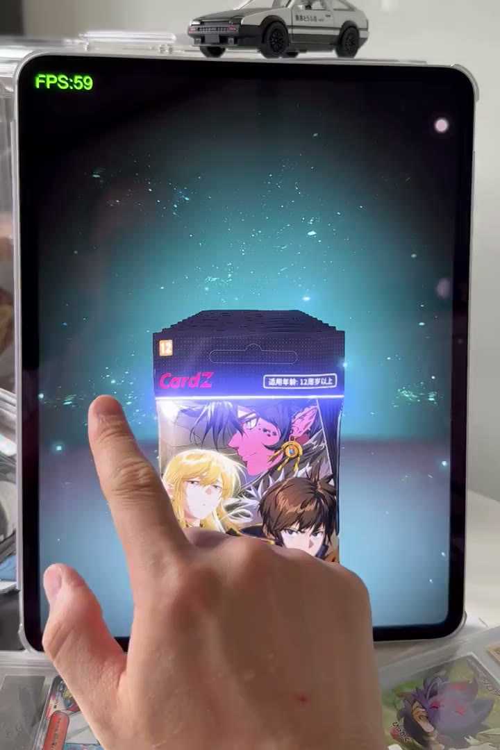 Live footage of opening cards on an iPad